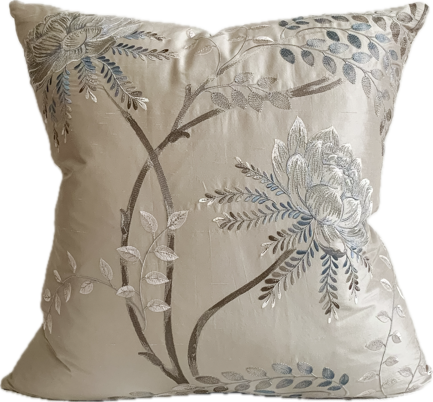 Silk designer accent pillow with flowers and branches.  Light blue petals and leaves on a shimmery taupe background