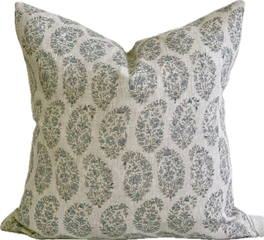 Light blue and gray botanical print pillow.  Light blue and gray floral paisley motif against a light gray linen  background.