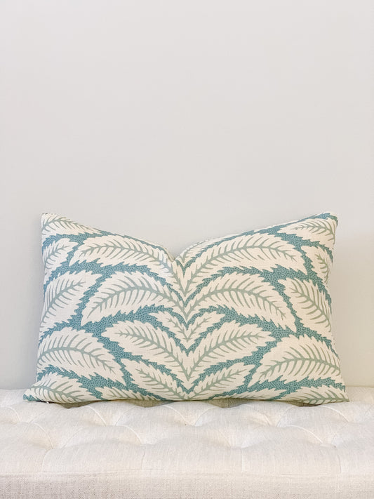Designer lumbar pillow with palm motif in aqua and cream tones.  Large scale geometric.
