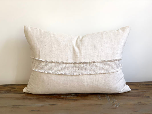 Linen lumbar pillow with decorative tape
