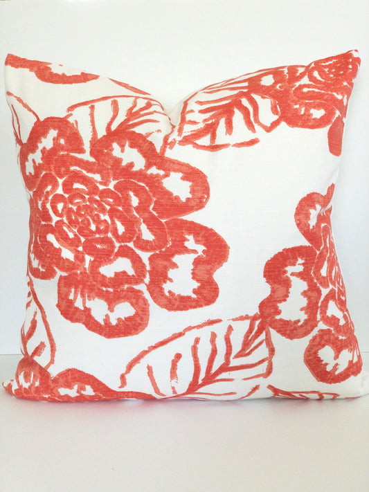 Coral designer pillow with large flowers 