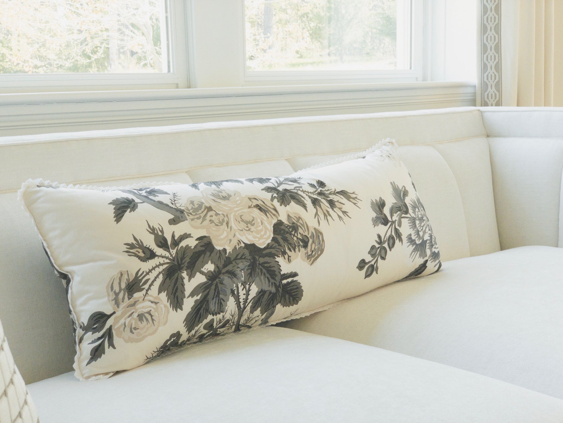 Long lumbar designer custom made floral pillow cover with white trim