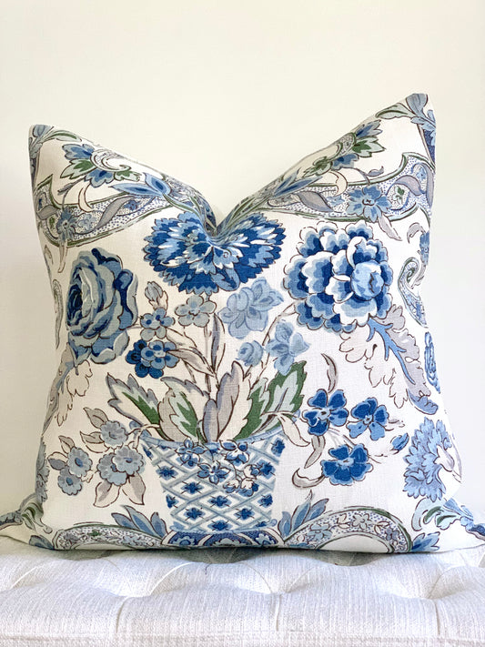 blue and white floral designer pillow with large flowers