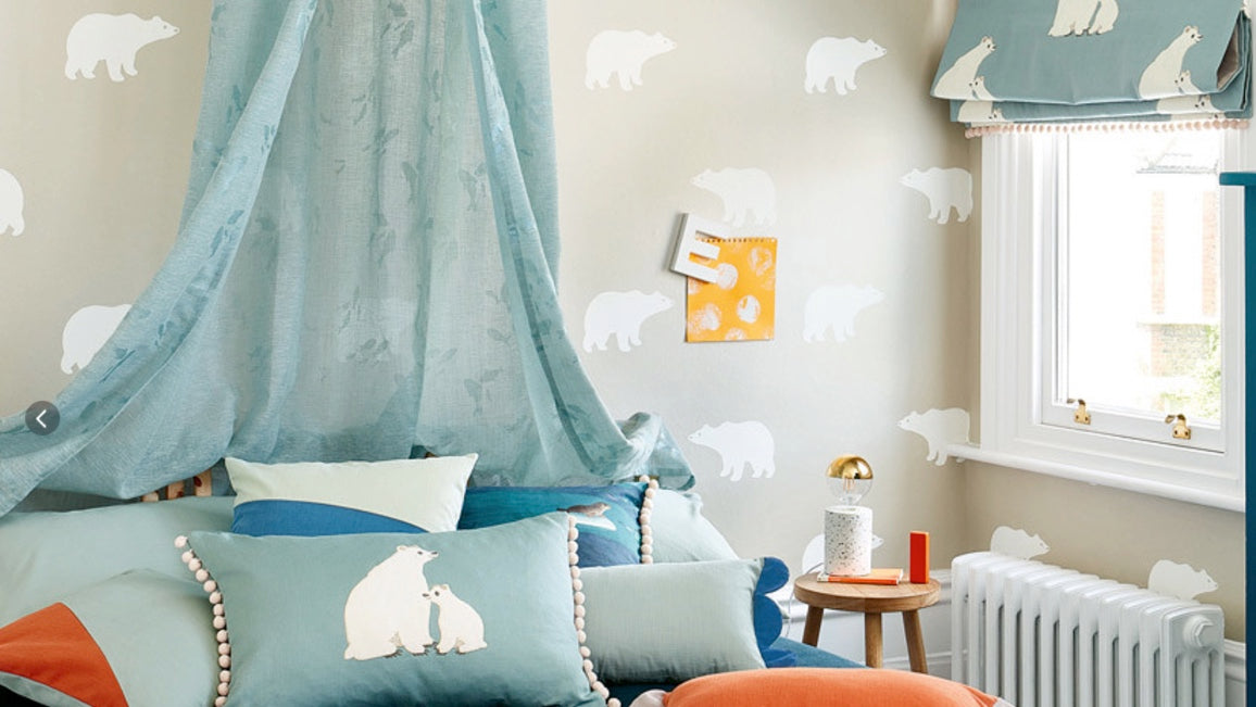Children's bedroom with polar bear motif pilow