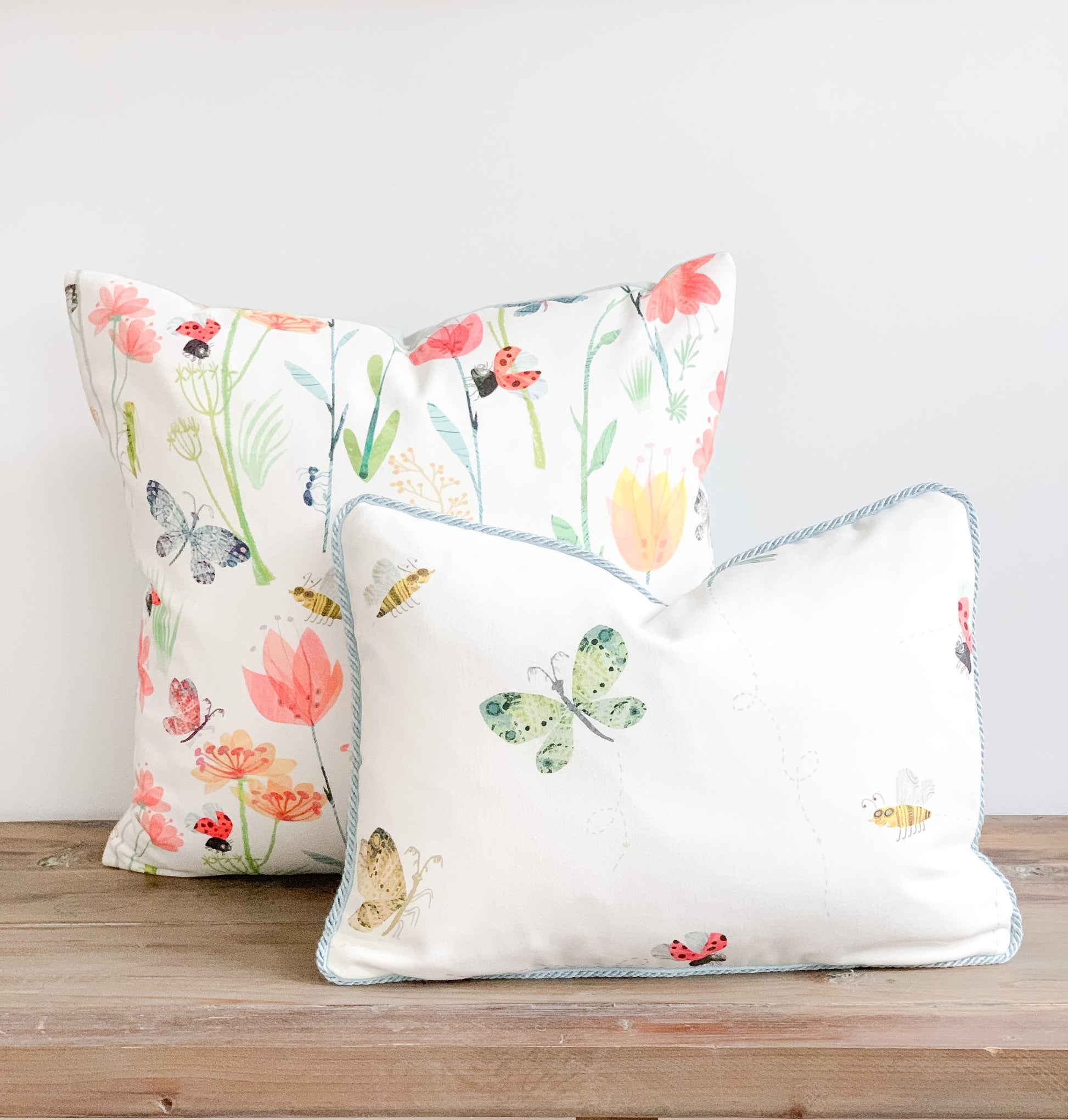butterfly motif decorative pillow in white